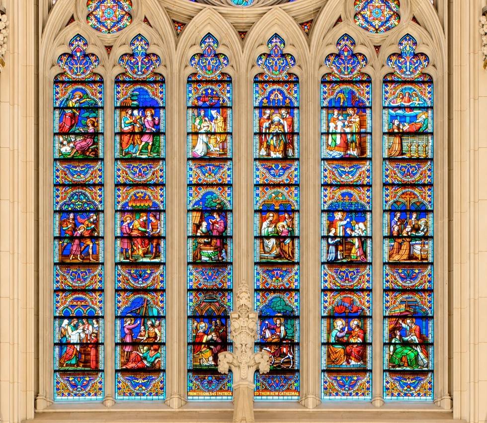 The Life of St. Patrick window: six lancets in three registers.